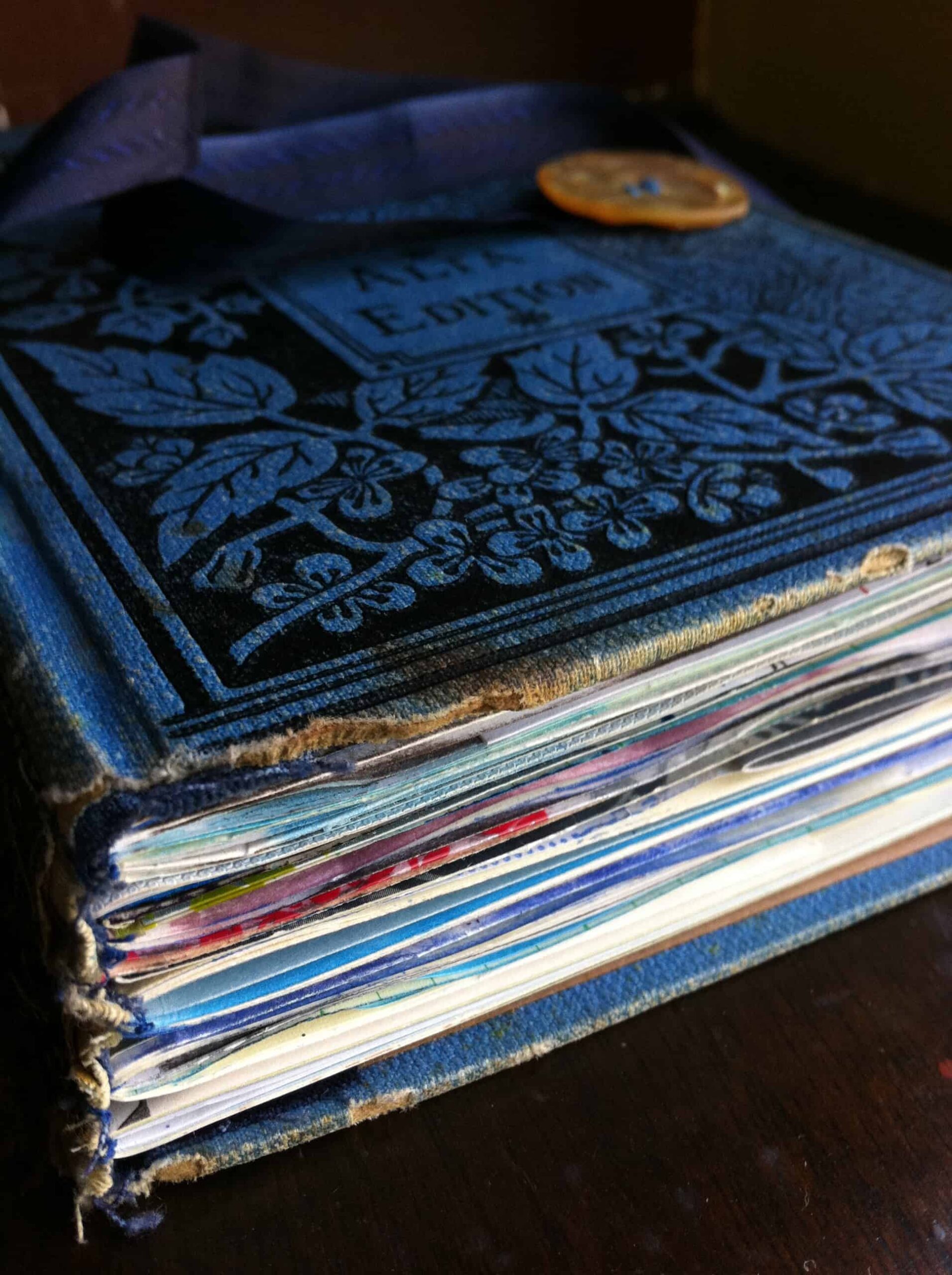 A stack of journals by Betsy Cañas Garmon with blue overtones